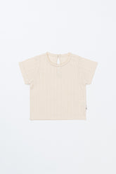 Flat Lay of Avauma Le Petite White Oat Short Sleeve Knit Top, Puff Sleeve Baby T-Shirt in Soft Beige
